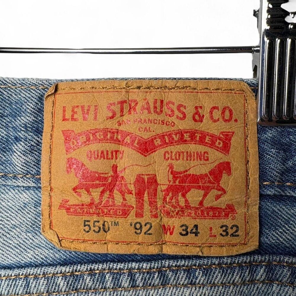 Levi's 550 '92 Early 2010s Reissue Light Wash Distressed Jeans 34x32 - Picture 6 of 11